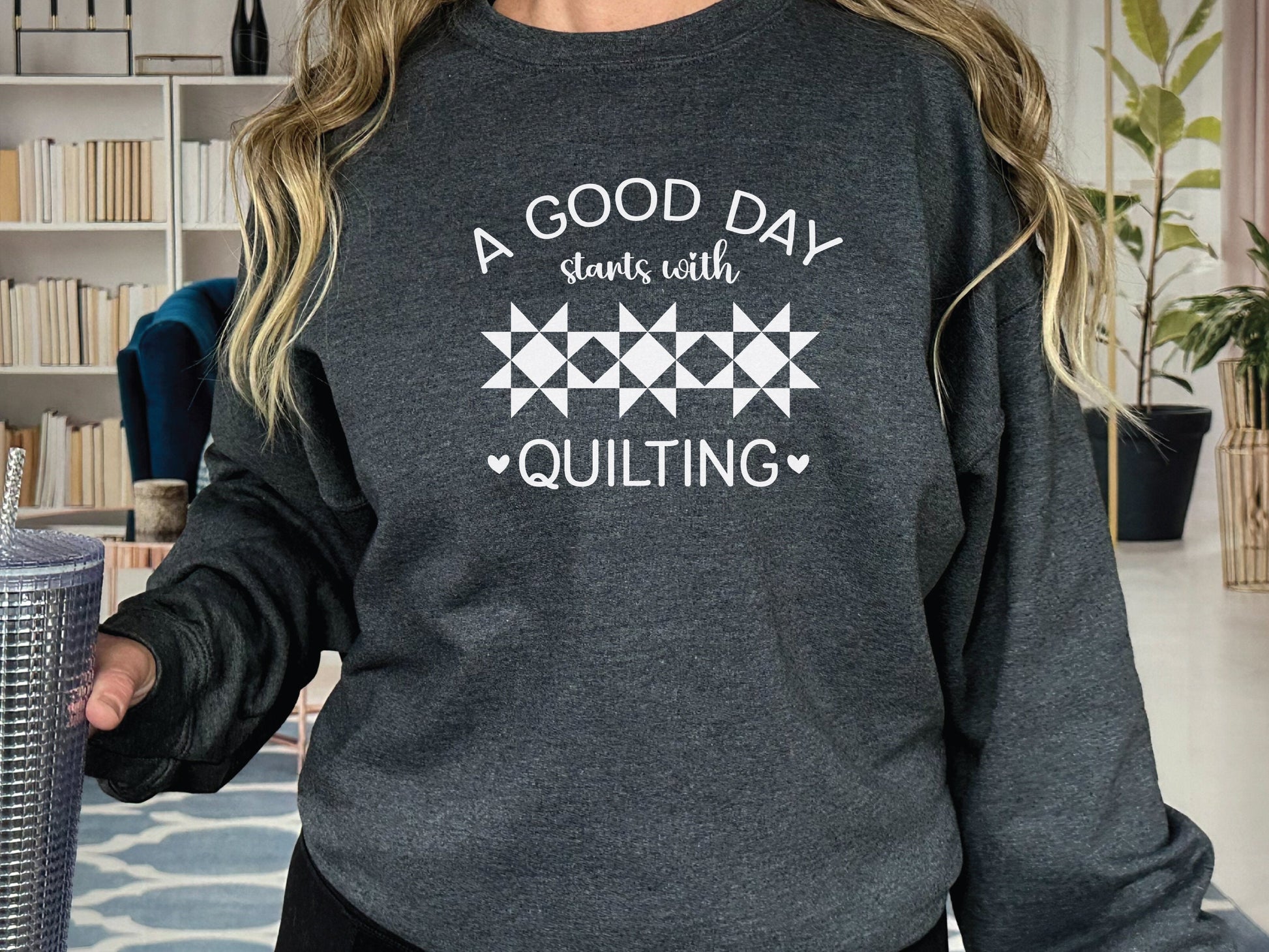 A Good Day Starts With Quilting Sweatshirt. Unisex sizing. Dark Grey sweatshirt with fun white text.